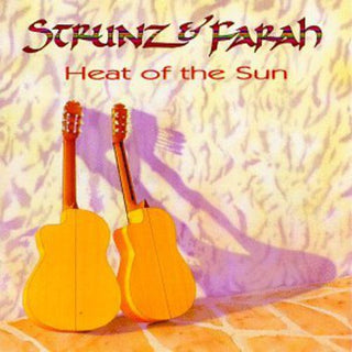 the album cover for Strunz & Farah - Heat of the Sun