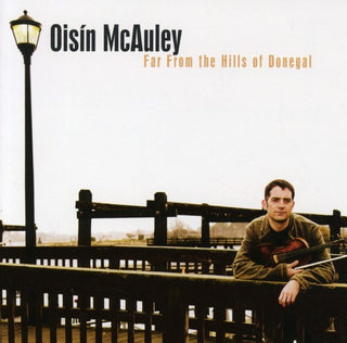 the album cover for Oisin Mcauley - Far from the Hills of Donegal