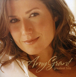 the album cover for Amy Grant - Greatest Hits