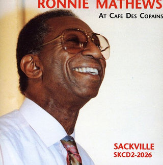 the album cover for Ronnie Mathews - At Cafe Des Copains