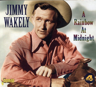 the album cover for Jimmy Wakely - Rainbow at Midnight