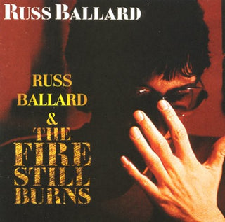 the album cover for Russ Ballard - Fire Still Burns