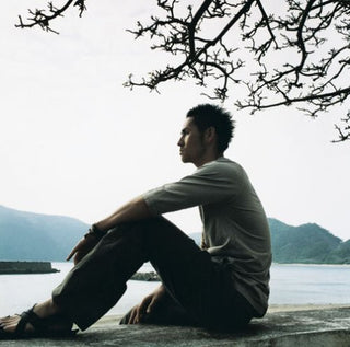 the album cover for Kosuke Atari - Kizuna