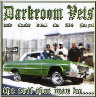 the album cover for Darkroom Vets - The Evil That Men Do