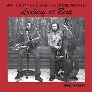 the album cover for Niels-Henning Ørsted Pedersen - Looking at Bird