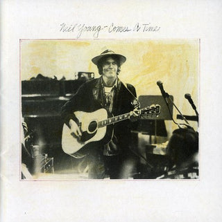 the album cover for Neil Young - Comes a Time