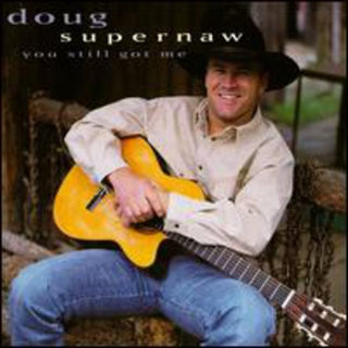 the album cover for Doug Supernaw - You Still Got Me