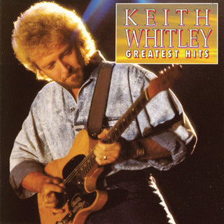 the album cover for Keith Whitley - Greatest Hits