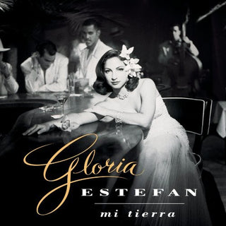 the album cover for Gloria Estefan - Mi Tierra