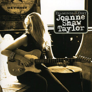the album cover for Joanne Shaw Taylor - Diamonds in the Dirt