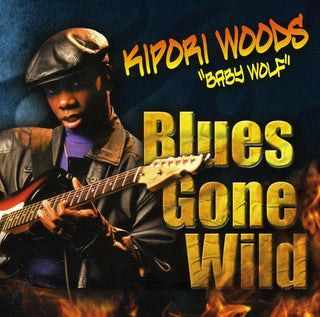 the album cover for Kipori "Baby Wolf" Woods - Blues Gone Wild