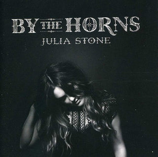 the album cover for Julia Stone - By The Horns