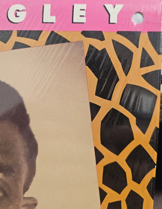 Tommy Ridgley- The New Orleans King Of The Stroll (Hole Punch)