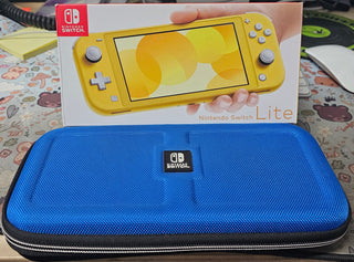Nintendo Switch Lite (Yellow w/ Blue Carrying Case)