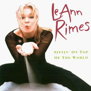 the album cover for LeAnn Rimes - Sittin on Top of the World