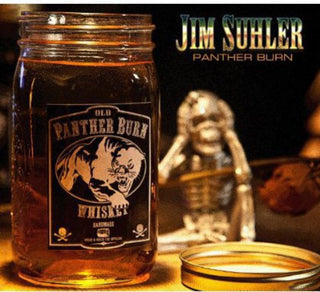 the album cover for Jim Suhler - Panther Burn
