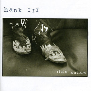 the album cover for Hank Williams 3 - Risin Outlaw