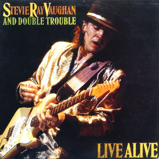 the album cover for Stevie Vaughan Ray - Live Alive