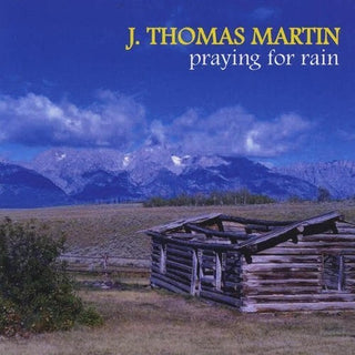 the album cover for Thomas Martin J - Praying for Rain