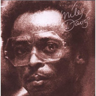the album cover for Miles Davis - Get Up With It