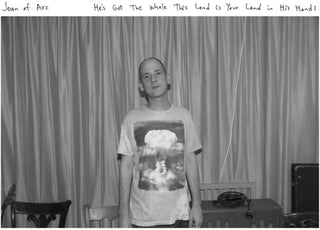 the album cover for Joan Of Arc - He's Got The Whole This Land Is Your Land in His Hands