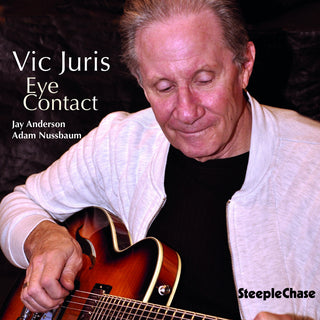 the album cover for Vic Juris - Eye Contact