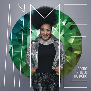 the album cover for Aymée Nuviola - Como Anillo Al Dedo