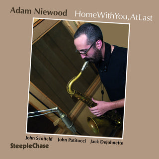 the album cover for Adam Niewood - Home with You at Last
