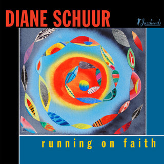 the album cover for Diane Schuur - Running On Faith