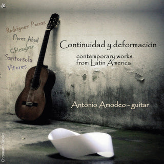 the album cover for Abad / Amodeo - Piano Trios