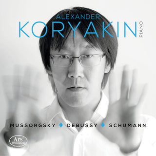 the album cover for Debussy / Koryakin - Piano Works By Debussy / Mussorgsky / Schumann