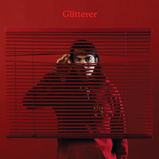 the album cover for Glitterer - Looking Through The Shades