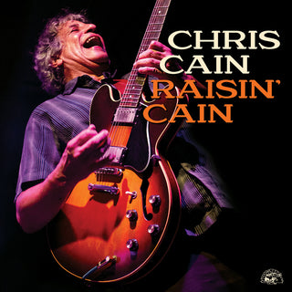 the album cover for Chris Cain - Raisin' Cain