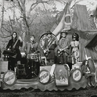 the album cover for The Raconteurs - Consolers Of The Lonely