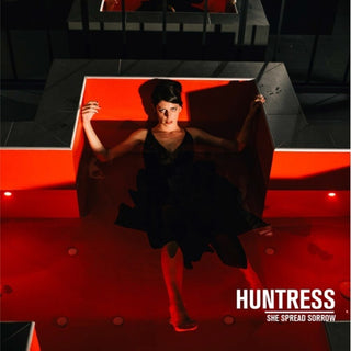 the album cover for She Spread Sorrow - Huntress