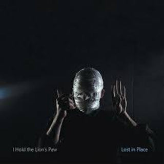 the album cover for I Hold the Lion's Paw - Lost In Place