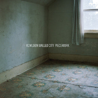 the album cover for Kowloon Walled City - Piecework (Blue) [Colored Vinyl] (Wht) [Indie Exclusive]