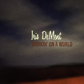 the album cover for Iris DeMent - Workin' On A World