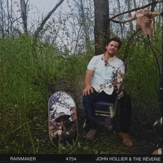 the album cover for John Hollier & The Reverie - Rainmaker