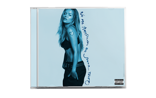 the album cover for Karol G - NO ME ARREPIENTO DE SENTIR TANTO