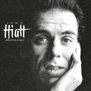 the album cover for John Hiatt - Bring The Family (Hol)