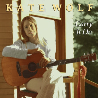 the album cover for Kate Wolf - Carry It On