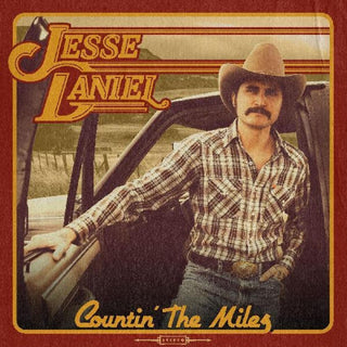 the album cover for Jessie Daniel - Countin' The Miles [LP]