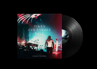 the album cover for Tiken Fakoly  Jah - Live Salle Pleyel (Fra)