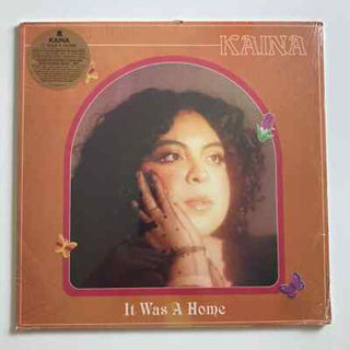 the album cover for Kaina - It Was A Home [Colored Vinyl] (Ylw) (Can)