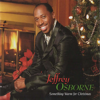 the album cover for Jeffrey Osborne - Something Warm For Christmas [Colored Vinyl] [Limited Edition] (Red)