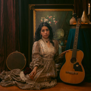 the album cover for Amanda Pascali - Roses And Basil