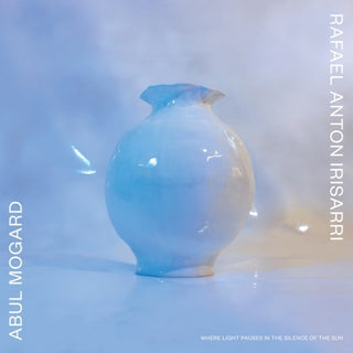 the album cover for Abul Mogard  / Rafael Anton Irisarri - Where Light Pauses In The Silence Of The Sun