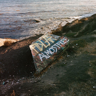 the album cover for FIDLAR - Almost Free - Frosted Yellow [Colored Vinyl] (Ylw)