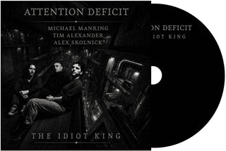 the album cover for Attention Deficit - The Idiot King